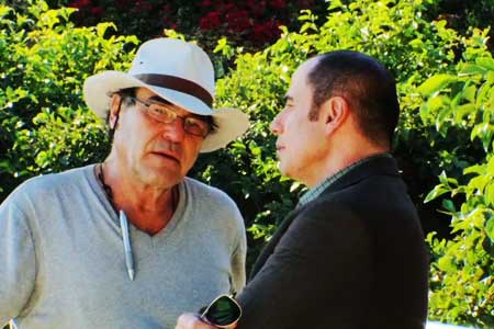 Oliver Stone and John Travolta on Savages set